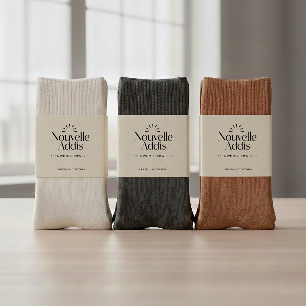 Nouvelle Addis socks in White, Charcoal, and Camel